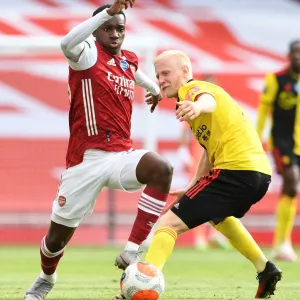 Arsenal's Eddie Nketiah Clashes with Watford's Will Hughes in Premier League Showdown