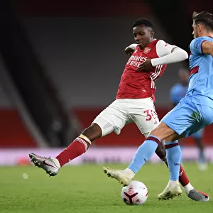 Arsenal's Eddie Nketiah Closes In on West Ham's Aaron Creswell in Intense Arsenal v West Ham United Premier League Clash