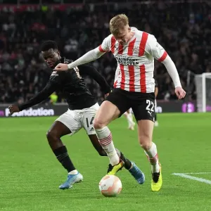 Arsenal's Eddie Nketiah Faces Off Against PSV's Jarrad Branthwaite in Europa League Clash