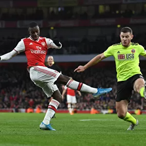 Arsenal's Eddie Nketiah Faces Off Against Sheffield United's Jack O'Connell in Intense Premier League Showdown