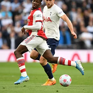 Arsenal's Eddie Nketiah Faces Off Against Tottenham's Eric Dier in Intense Premier League Clash