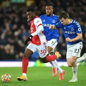 Arsenal's Eddie Nketiah Outmaneuvers Everton's Seamus Coleman in Premier League Clash
