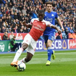 Arsenal's Eddie Nketiah Outmaneuvers Leicester's Ben Chilwell in Thrilling Premier League Clash (Leicester City vs Arsenal, 2018-19) Arsenal's Eddie Nketiah Outmaneuvers Leicester's Ben Chilwell in Thrilling Premier League Clash (Leicester City vs Arsenal, 2018-19)