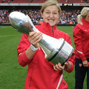 Arsenal's Ellen White Celebrates with WSL Trophy Amidst Arsenal's 1:0 Lead over Swansea City in the Premier League, Emirates Stadium (2011)