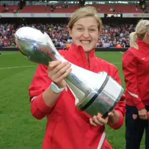 Arsenal's Ellen White Celebrates with WSL Trophy Amidst Arsenal's 1:0 Lead over Swansea City in the Premier League, Emirates Stadium (2011)