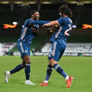 Arsenal's Elneny and Maitland-Niles Celebrate Goals in UEFA Europa League Match Against Dundalk Arsenal's Elneny and Maitland-Niles Celebrate Goals in UEFA Europa League Match Against Dundalk