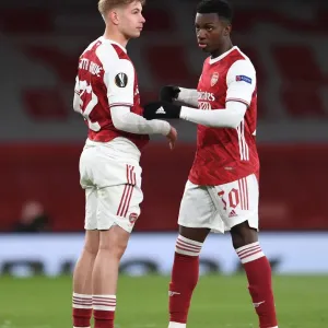Arsenal's Emile Smith Rowe and Eddie Nketiah Celebrate Semi-Final Advancement vs. Villarreal in Empty Emirates Stadium Arsenal's Emile Smith Rowe and Eddie Nketiah Celebrate Semi-Final Advancement vs. Villarreal in Empty Emirates Stadium