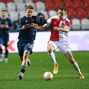 Arsenal's Emile Smith Rowe Faces Off Against Slavia Praha's Lukas Provod in Europa League Quarterfinal Match, Prague, 2021