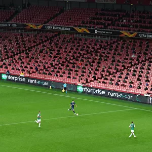 Arsenal's Emirates Stadium: A Ghostly Europa League Showdown Against Rapid Wien (December 2020)