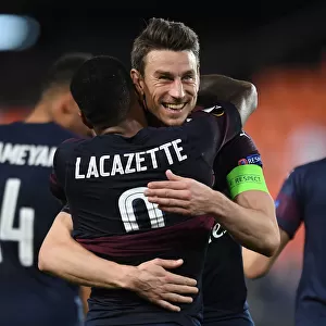 Arsenal's Emotional Reunion: Lacazette and Koscielny's Heartfelt Hug in Europa League Semifinal