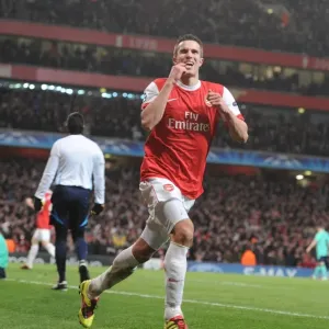 Arsenal's Epic Victory: Robin van Persie Stuns Barcelona with a Stunning Goal in the Champions League