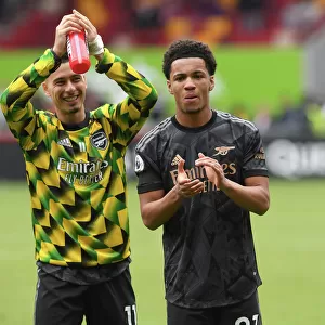 Arsenal's Ethan Nwaneri and Gabriel Martinelli Celebrate Victory with Fans at Brentford Community Stadium