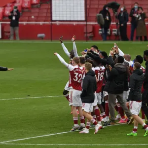 Arsenal's Euphoric Moment: Celebrating Victory Over Brighton & Hove Albion in the 2020-21 Premier League Arsenal's Euphoric Moment: Celebrating Victory Over Brighton & Hove Albion in the 2020-21 Premier League
