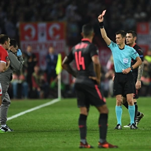 Arsenal's Europa League Clash with Crvena Zvezda: Hicham Zakrani Shows Red Card to Milan Rodic
