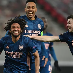 Arsenal's Europa League Triumph: Elneny, Aubameyang, and Tierney Celebrate 3-Goal Lead Over Olympiacos in Piraeus