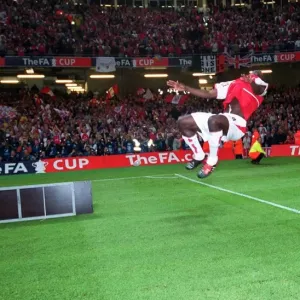 Arsenal's FA Cup Triumph: Kolo Toure's Euphoric Backflip, Millennium Stadium, 2003 Arsenal's FA Cup Triumph: Kolo Toure's Euphoric Backflip, Millennium Stadium, 2003