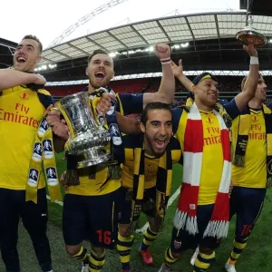 Arsenal's FA Cup Victory: Celebrating with Chambers, Ramsey, Flamini, Oxlade-Chamberlain, and Monreal Arsenal's FA Cup Victory: Celebrating with Chambers, Ramsey, Flamini, Oxlade-Chamberlain, and Monreal
