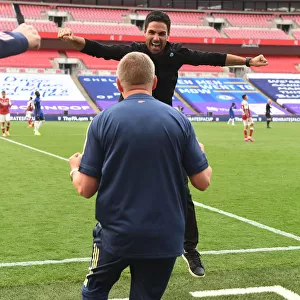 Arsenal's Empty FA Cup Victory: Mikel Arteta Celebrates at Wembley Amidst the Pandemic