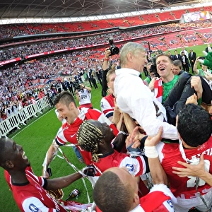 Arsenal's FA Cup Victory: Wenger Lifted in Triumphant Team Celebration