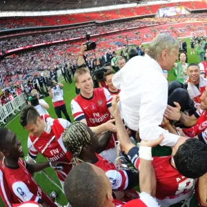 Arsenal's FA Cup Victory: Wenger Lifted on Shoulders by Jubilant Squad Arsenal's FA Cup Victory: Wenger Lifted on Shoulders by Jubilant Squad