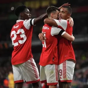 Arsenal's Fabio Vieira, Gabriel Jesus, and Albert Sambi Lokonga Celebrate Goals Against FK Bodo/Glimt in Europa League Match