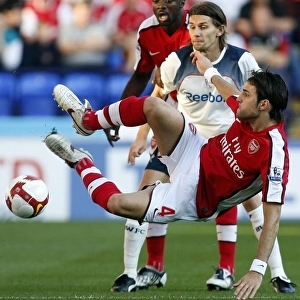 Arsenal's Fabregas Fends Off Bolton: A Premier League Showdown