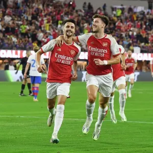 Arsenal's Five-Goal Blitz: Fabio Vieira and Kieran Tierney Celebrate Against FC Barcelona in Pre-Season Friendly