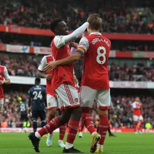 Arsenal's Five-Goal Blitz: Martin Odegaard and Eddie Nketiah Celebrate against Nottingham Forest (2022-23)