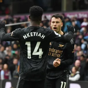 Arsenal's Four-Goal Spree: Martinelli and Nketiah's Thrilling Celebration vs. Aston Villa (2022-23)