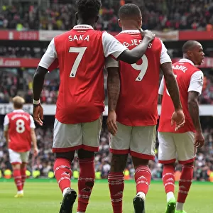 Arsenal's Gabriel Jesus and Bukayo Saka Celebrate Goals Against Tottenham in 2022-23 Premier League
