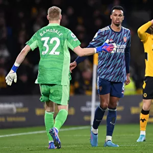 Arsenal's Gabriel Magalhaes and Aaron Ramsdale Celebrate at Molineux: Wolverhampton Wanderers vs. Arsenal, Premier League 2021-22