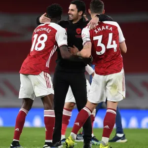 Arsenal's Glory: Arteta Celebrates with Partey and Xhaka after Beating Tottenham