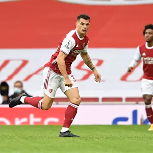 Arsenal's Granit Xhaka in Action: 2020-21 Premier League Match Against Sheffield United (Behind Closed Doors)