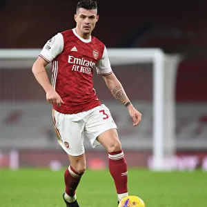 Arsenal's Granit Xhaka in Action at Emptied-Out Emirates Against Crystal Palace (Premier League 2020-21)