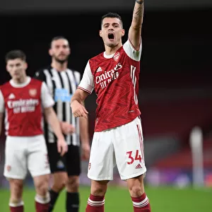 Arsenal's Granit Xhaka in Action against Newcastle United at Emptied Emirates Stadium (Premier League 2020-21)