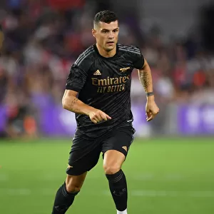Arsenal's Granit Xhaka in Action against Orlando City SC (2022-23 Pre-Season)