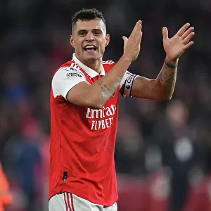 Arsenal's Granit Xhaka Celebrates with Fans after Arsenal v Manchester United in 2022-23 Premier League