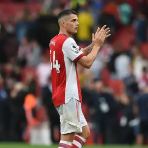 Arsenal's Granit Xhaka Celebrates with Fans after Arsenal vs. Chelsea Victory (2021-22)