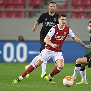 Arsenal's Granit Xhaka Clashes with Benfica's Pizzi in Europa League Showdown