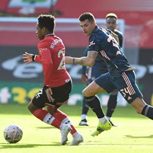 Arsenal's Granit Xhaka Closes Down Southampton's Kyle Walker-Peters in FA Cup Fourth Round Match