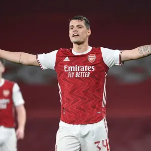 Arsenal's Granit Xhaka in Europa League Action vs Olympiacos (Behind Closed Doors) Arsenal's Granit Xhaka in Europa League Action vs Olympiacos (Behind Closed Doors)