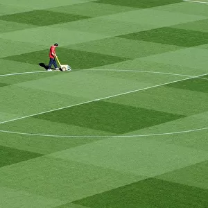 Arsenal's Groundsman Paul Ashcroft Prepares the Emirates Pitch for Arsenal's 2:1 UEFA Champions League Victory over Olympiacos (Group F)