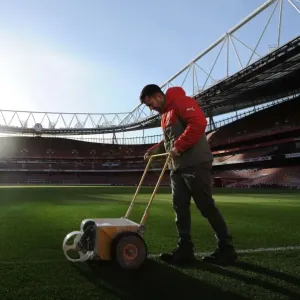 Arsenal's Groundsman Prepares the Pitch for Arsenal v West Bromwich Albion (2016-17)