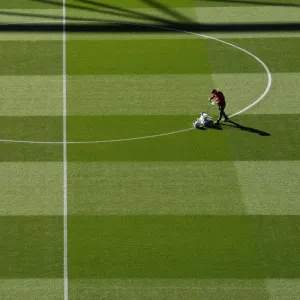 Arsenal's Groundsman Prepares Pitch for Carabao Cup Clash Against Brentford