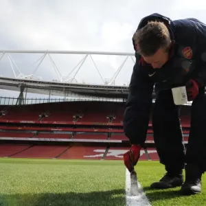 Arsenal's Groundsmen Prepare Emirates Stadium for Arsenal v Reading (2013)