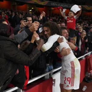Arsenal's Guendouzi Gifts Shirt to Ecstatic Fan After Europa League Victory Arsenal's Guendouzi Gifts Shirt to Ecstatic Fan After Europa League Victory
