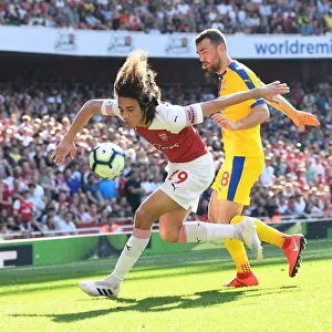 Arsenal's Guendouzi Stands Firm Against Crystal Palace's McArthur