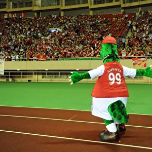 Arsenal's Gunnersaurus Roars in Hangzhou: Arsenal FC's Mascot at 2011 Pre-Season Match in China