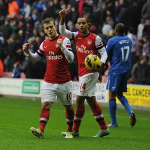 Arsenal's Hard-Fought Victory over Wigan Athletic (2012-13): Jack Wilshere and Theo Walcott Celebrate