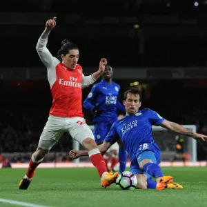 Arsenal's Hector Bellerin Clashes with Leicester's Christian Fuchs in Premier League Showdown Arsenal's Hector Bellerin Clashes with Leicester's Christian Fuchs in Premier League Showdown